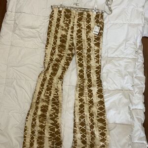Free People pull on mid rise  flare jeans, tan & brown ,size 29